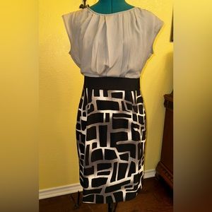 Gray and black midi length dress